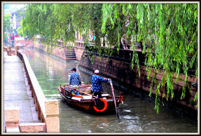 Garbage collectors on the canal