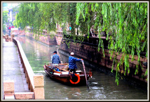Garbage collectors on the canal