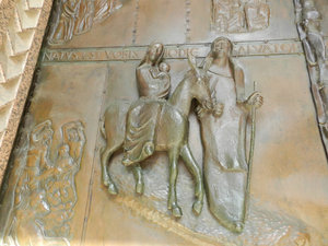 Joseph and Mary riding the donkey looking for a stable