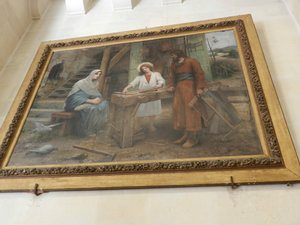 Joseph teaching Jesus to be a carpenter