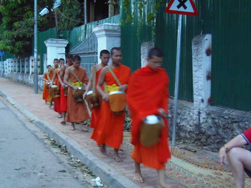 Monks coming down the street