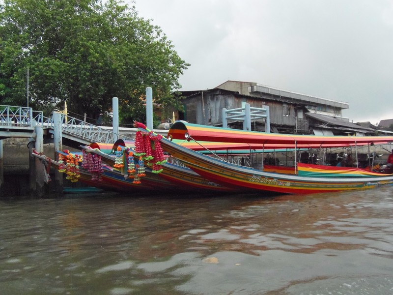Gaily decorated long-tail boats on the canal