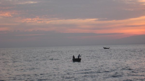 Sunset with a traditional fishing boat