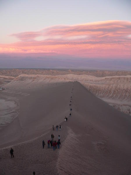 Heading back down the Great Dune after sunset