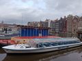 Canal cruise and Amsterdam Centraal station in the background 