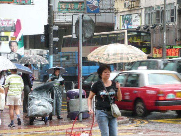 Outside in the rain in Mong kok.