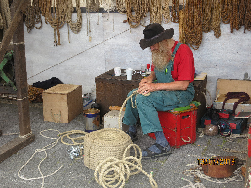Rope maker demonstrating his craft