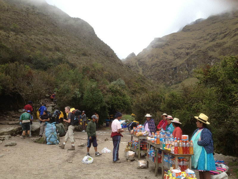 Peruvian Villagers Selling Drinks and Snacks
