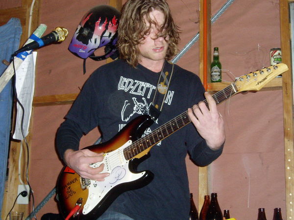 Ben rocking out in our garage...or car hold