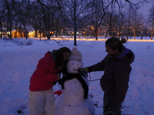 Nikki feeding the snow man