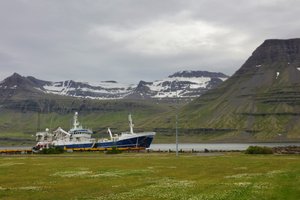Ship in a western fjord south of Hengifoss waterfall
