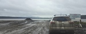 Waiting for the Mackenzie River ferry at Tsiigehtchic