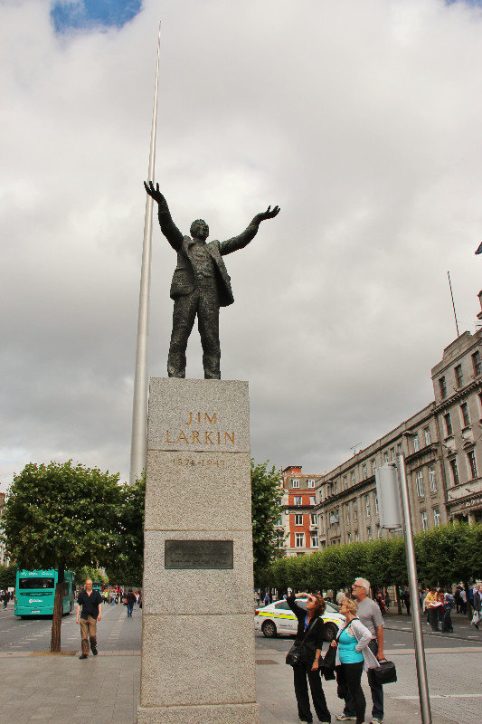 Statue of James Larkin, Monument of Light (Spire of Dublin) in background.