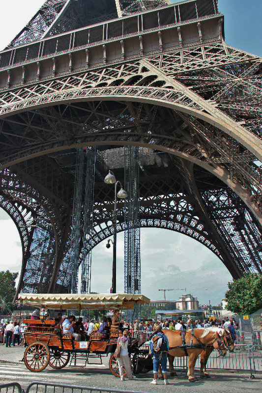 Horse carriage rides under the Eiffel Tower