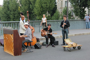 Buskers on Pont St. Louis pedestrian bridge