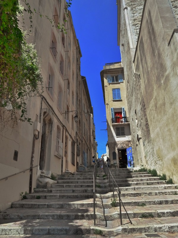 Ancient, worn stairway entering Le Panier district of Marseille