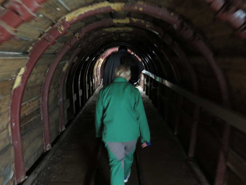 Chris entering the salt mine, in her miner coveralls