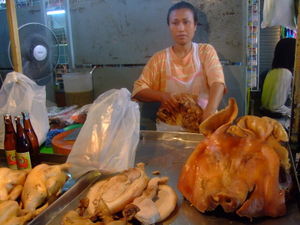 buying the pigs head & chicken for Pa-Kam at the market
