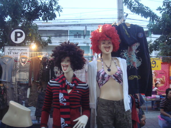scary models at the night market
