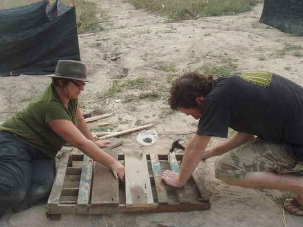 Penny & Stuart making a shower tray at the camp