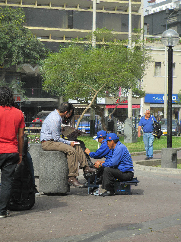 Shoe cleaners in the park