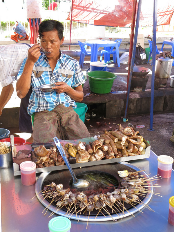 Locals eating pork hot pot - Yangon