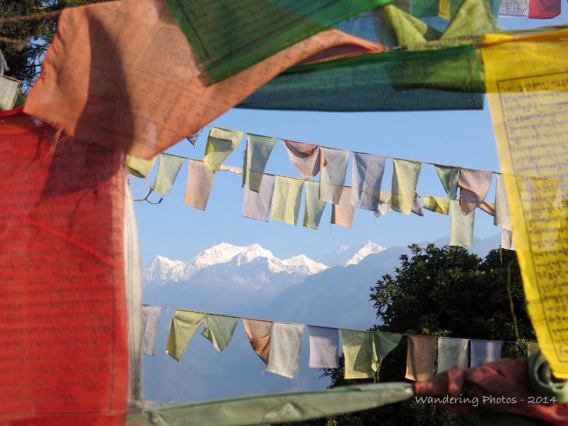 Kangchenjunga Mountain Range through the prayer flags of Pemayangtse Monastery