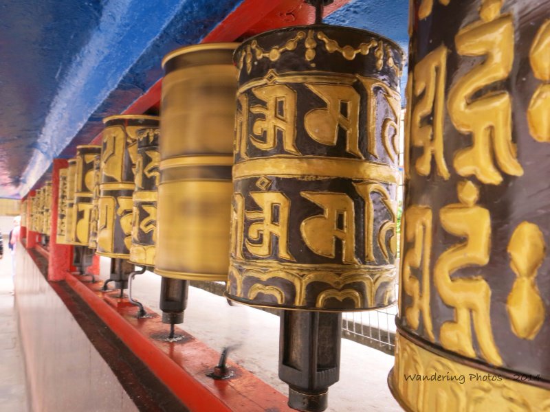 Spinning prayer wheels at the Do Drul Chorten Stupa - Gangtok Sikkim