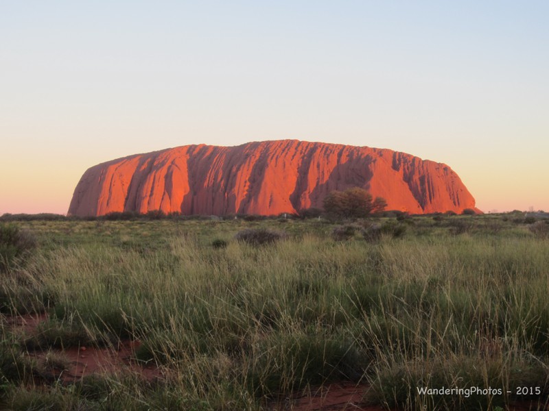 The changing colours of Uluru at sunset