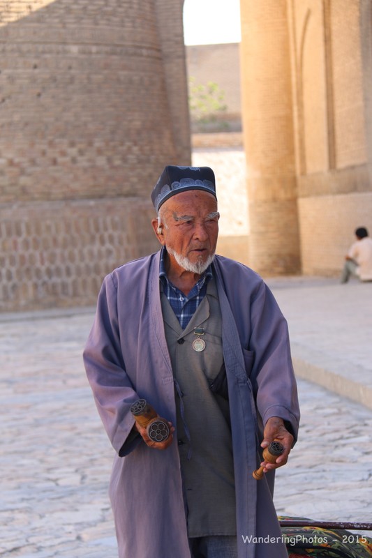 A bread stamp seller in Bukhara