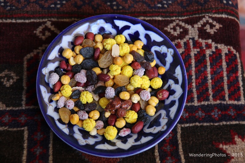 Dish of nuts, raisins & sugared almonds & peanuts