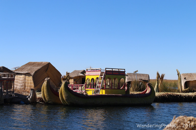 Uros floating reed islands & traditional boat - Lake Titicaca