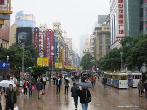 A rainy day on Nanjing Road - the main shopping street - Shanghai China    