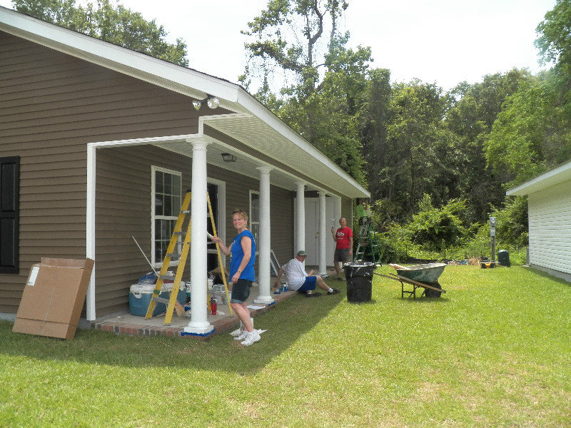 Amy, Mike and Mark paint columns