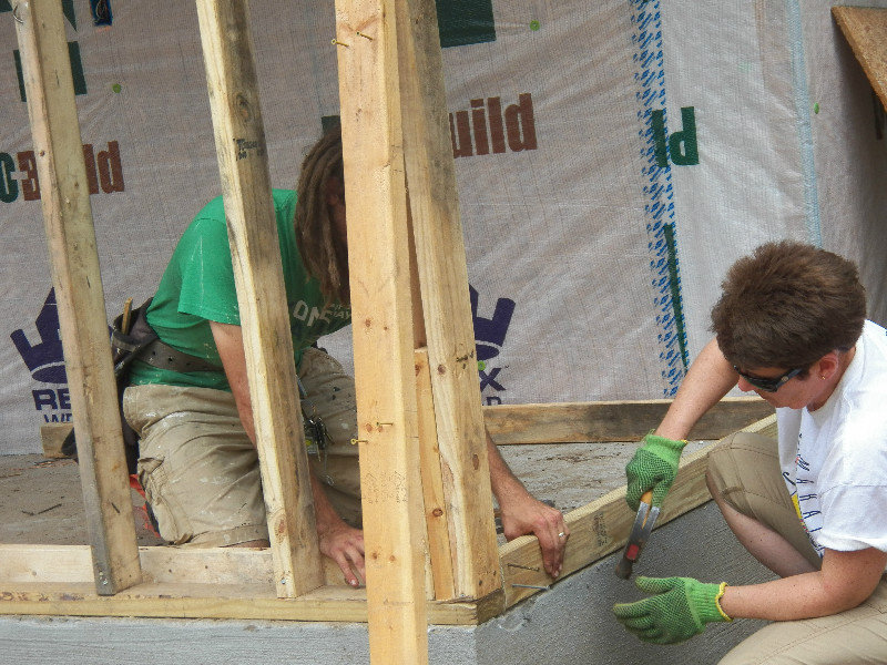Connie and Drew start framing the storage shed on one of the houses