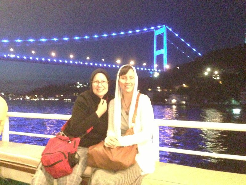 Liz and sister Mary on night time boat ride. 
