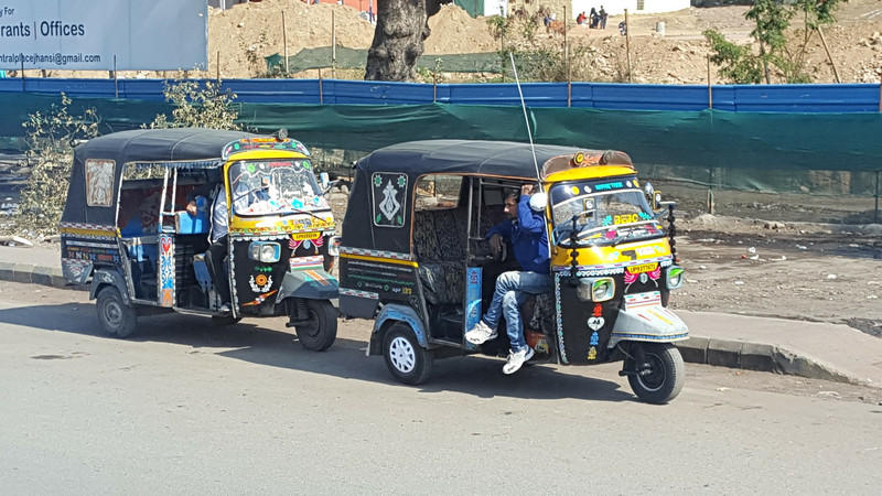 Tuk-tuk's are decorated to welcome tourists at the Jhansi train station