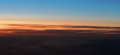 Sonnenaufgang über dem Pazifik - aus dem Flugzeug