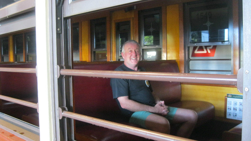 a happy man in train