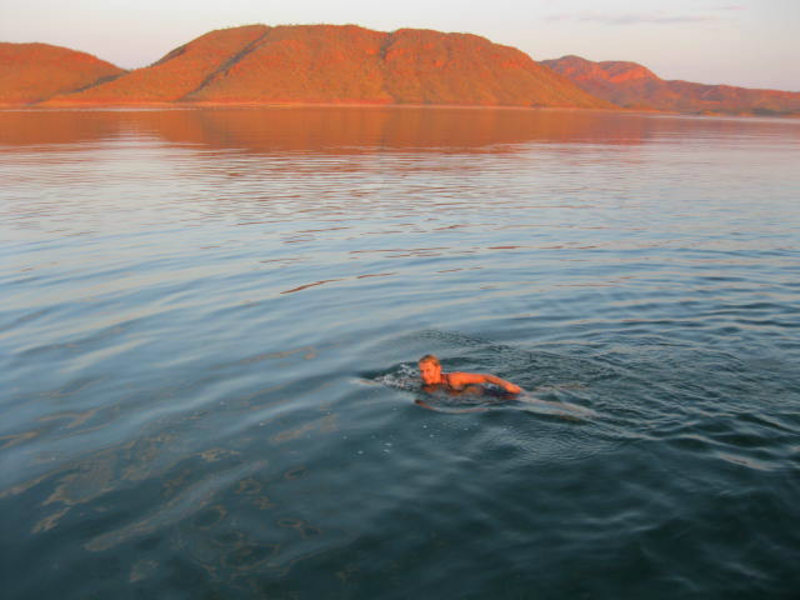 swimming at sunset in Lake Argyle