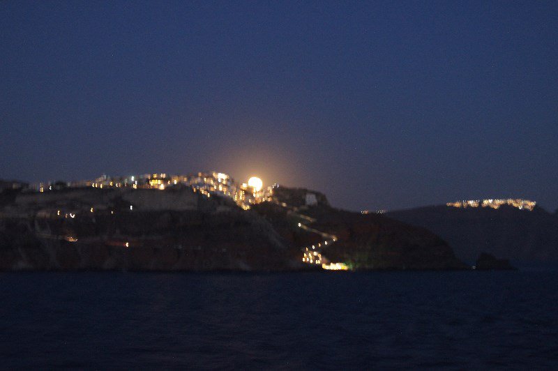 Moon rising over Santorini