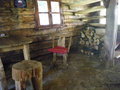 Wood chairs and tables in a refugio