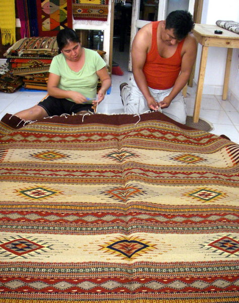 Reynaldo and Theresa, expert rug makers