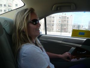 MaryAnne in the taxi.