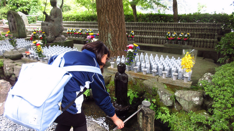 Pouring Water on a Statue of Jizō
