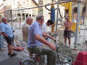 Old Men Watching Construction Workers