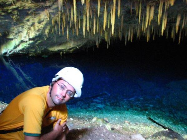 The blue water in the cave, with a very yellow ozzie shirt !