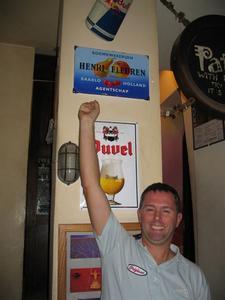 Me at the JoyRide cafe, with a very familiar sign from my home village in Holland