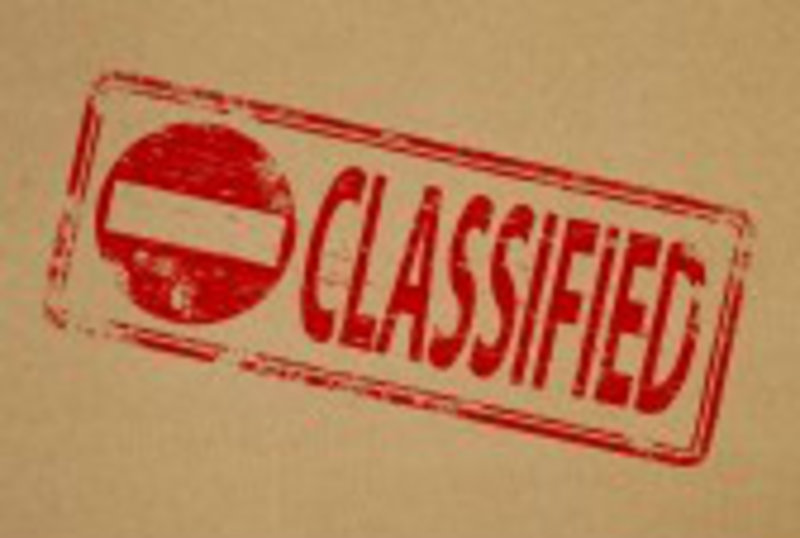 19870104-classified-rubber-stamp-symbol-on-brown-paper-background