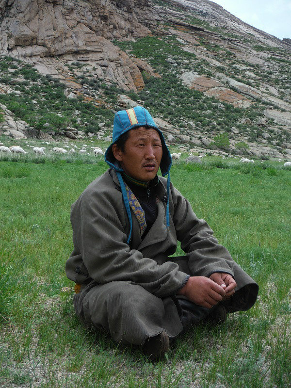 Shepherd in his traditional coat and sash